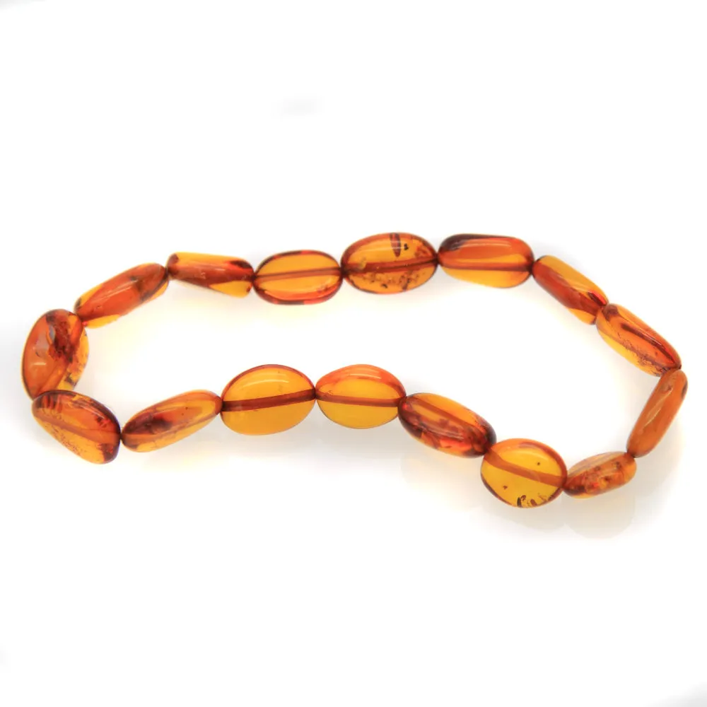 1AC925-B4: Amber Stretch Bracelet Ov Nuggets Honey