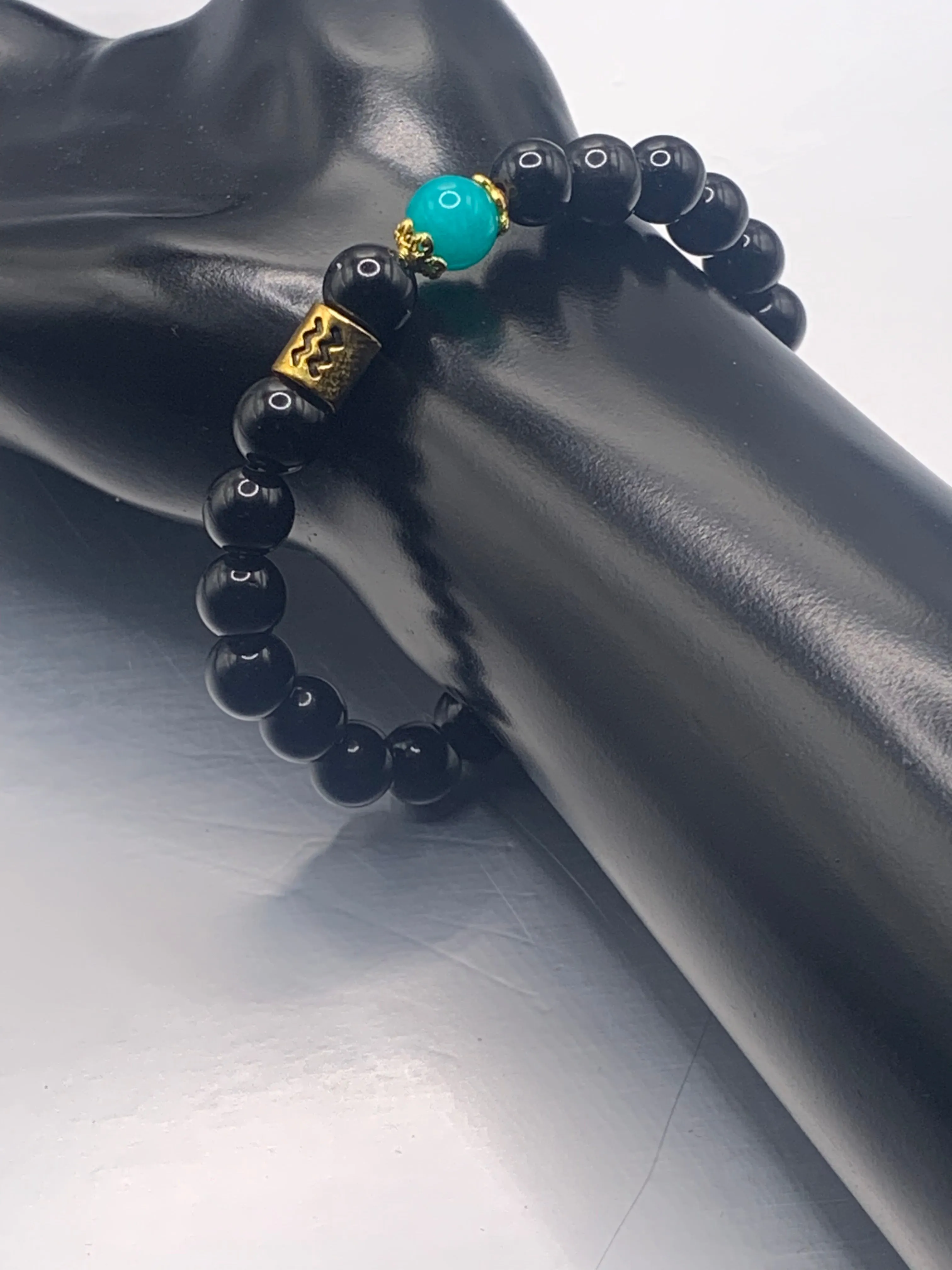 Aquarius Zodiac black obsidian with aquamarine chalcedony semi precious stone/crystal elastic beaded bracelet with gold accents