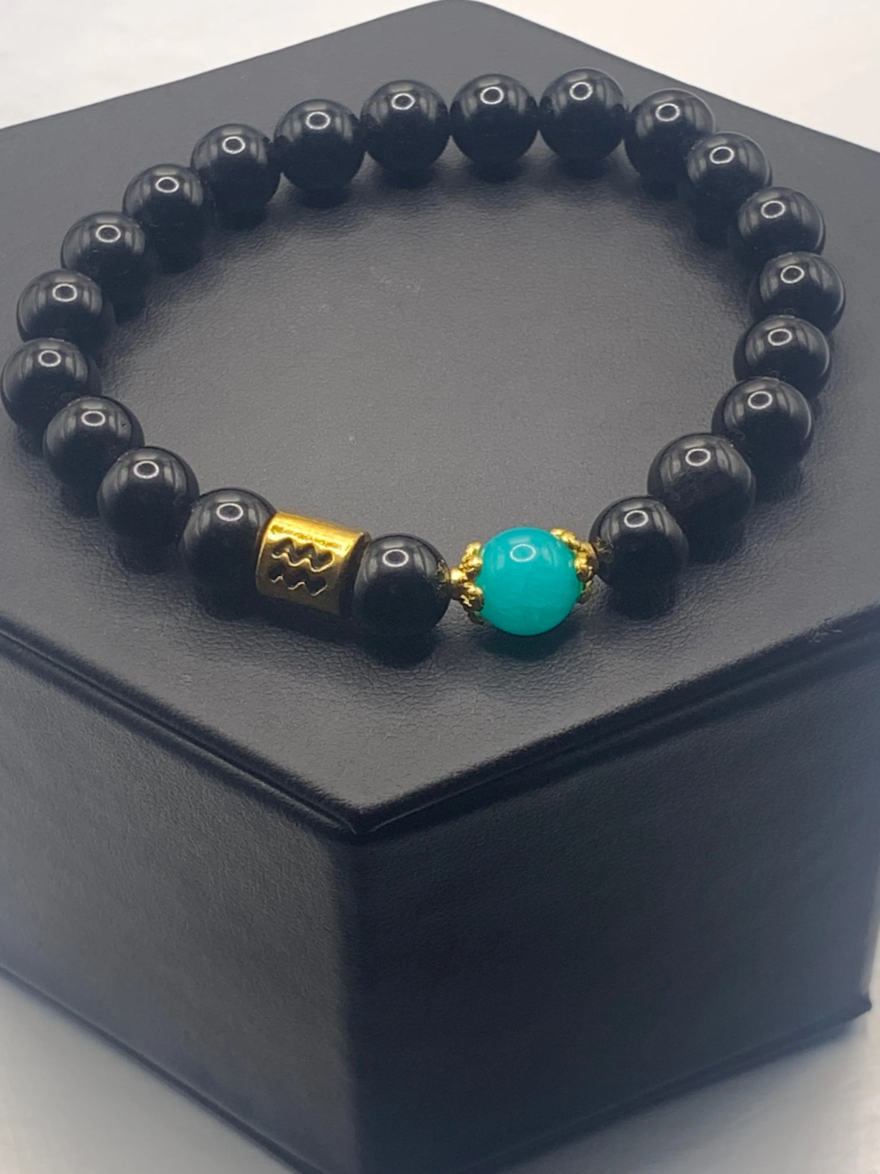 Aquarius Zodiac black obsidian with aquamarine chalcedony semi precious stone/crystal elastic beaded bracelet with gold accents